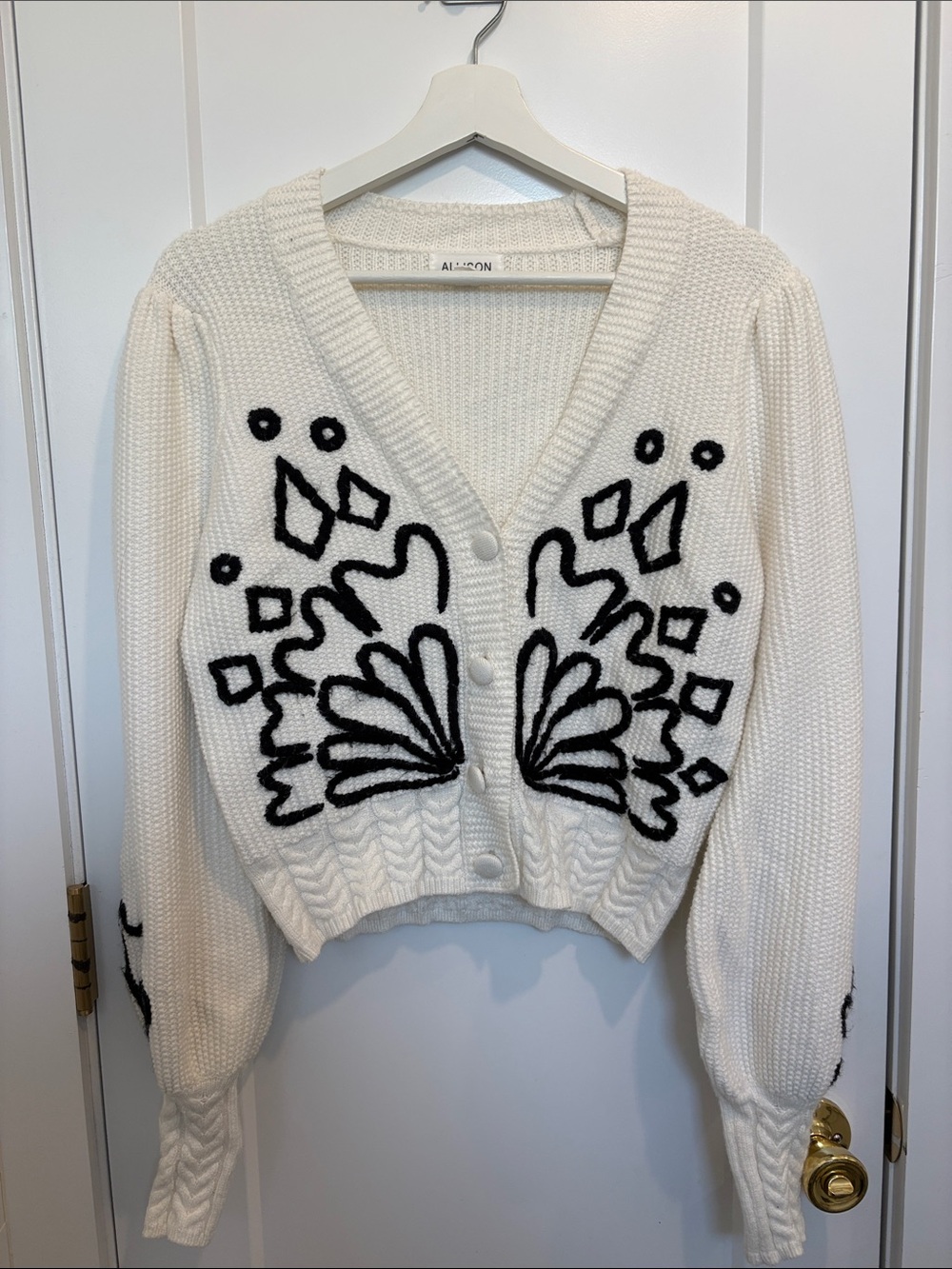 Allison White Cropped Cardigan with Black Floral Stitching